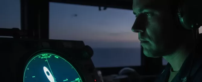 A U.S. Nacy Chief looks at a radar screen for UFOs.